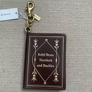 Coach Notebook Bag Charm brass/maple NWT